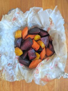 Roasted root vegetables in parchment paper