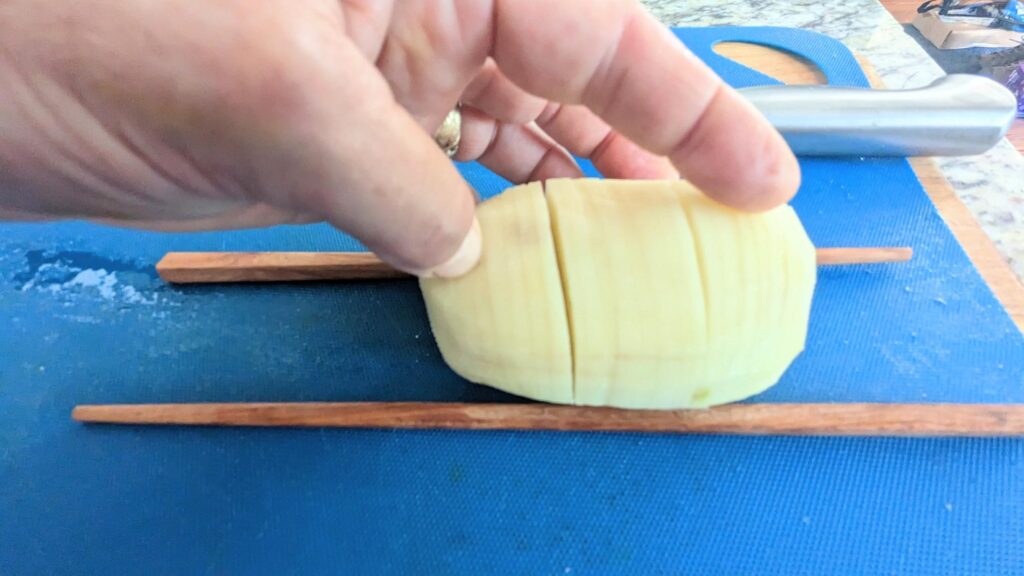 Cut Hasselback potatoes