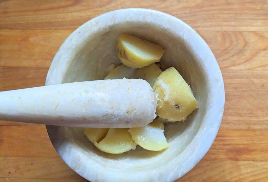 potatoes in a mortar
